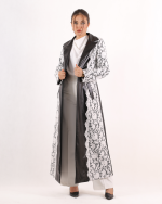 Delara abaya with a fabric combination of leather and lace.